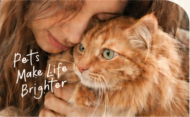 A woman cuddling her ginger cat, with the handwritten words “Pets Make Life Brighter”.